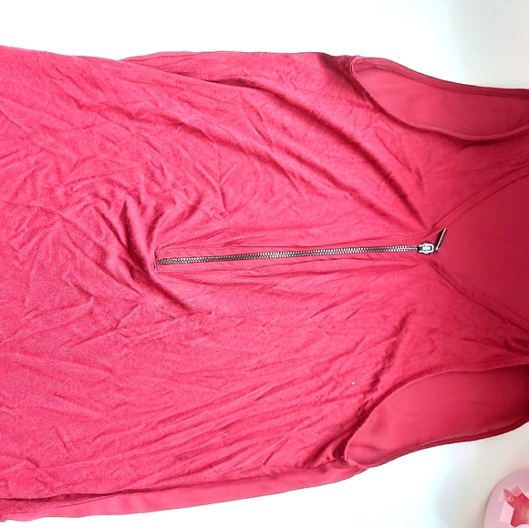 A red tank top with a ripper up the middle - Picture 3 of 3